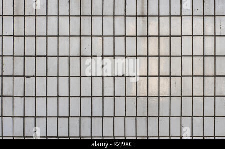 Ceramic USSR tile abstract texture in light grey color, typical soviet tiles on typical buildings Stock Photo