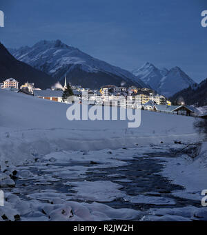 Austria, Tyrol, Ischgl, full moon night Stock Photo