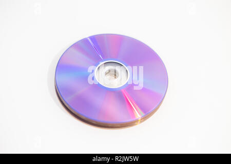 Pile of DVDs recordable DVDs CD CDs DVDR on a white background Stock Photo