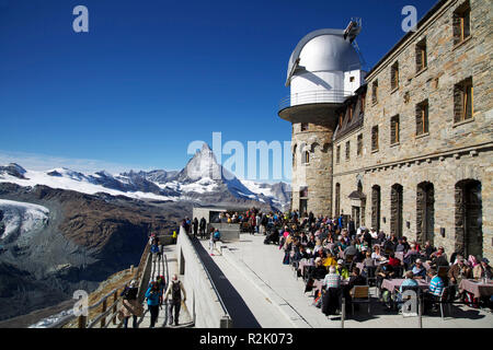 Terrace in front of the hotel and observatory on the Gorner ridge near Zermatt. View to the Matterhorn Stock Photo