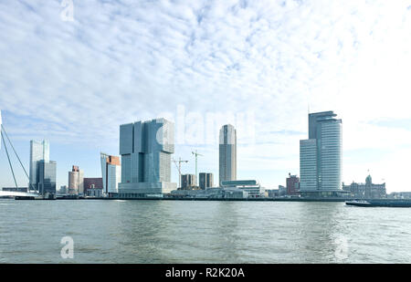 Rotterdam, district 'Head of South', seen from the Veerhaven, with the Erasmus Bridge (Ben van Berkel 1992-1997), and the Rotterdam (OMA, 2002-2014), the largest building of Netherlands, to the right the tower New Orleans (Alvaro Siza , 2008-2013), highest residential tower of Netherlands and double tower World Port Center (Norman Foster, 1997-2003) Stock Photo