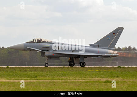 BERLIN - APR 27, 2018: German air force Eurofighter EF-2000 Typhoon fighter jet plane taking off during the Berlin ILA Air Show. Stock Photo