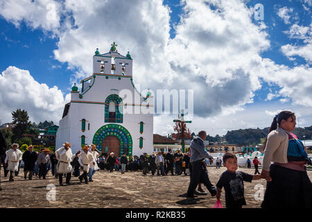 A funeral procesion crosses the plaza of Chamula, Chiapas, Mexico. Stock Photo