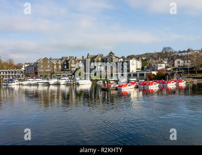 The Old England Hotel with Rental Boats and Motor Yachts Berthed on Lake Windermere at Bowness Cumbria England United Kingdom UK Stock Photo