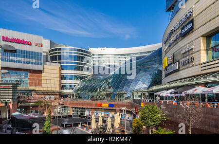 Złote Tarasy (Golden Terraces) shopping and entertainment complex with its signature transparend roof over the central indoor courtyard in central War Stock Photo