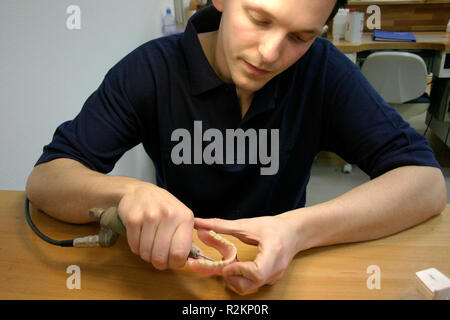 trainee in dental laboratory Stock Photo