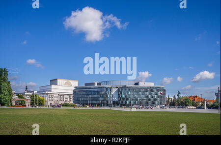 Piłsudski Square, the largest square of Poland's capital with view of the Metropolitan office building and the Grand Theatre - National Opera in the b Stock Photo