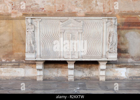 Roman sarcophagi (sarcophagus) in interior hallway of Campo Santo, monumental cemetery in Pisa, Italy. Stock Photo
