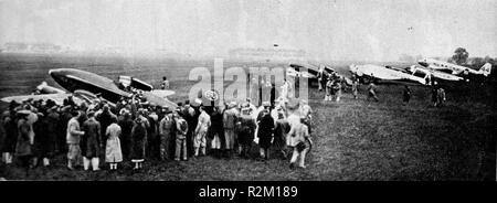 October 1934.  Competitors and spectators mingle before the Mildenhall England to Melbourne Australia air race Stock Photo