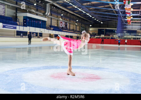 Talented Little Girl Figure Skating Stock Photo