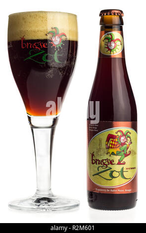 Bottle and glass of Brugse Zot Dubbel beer isolated on a white background Stock Photo