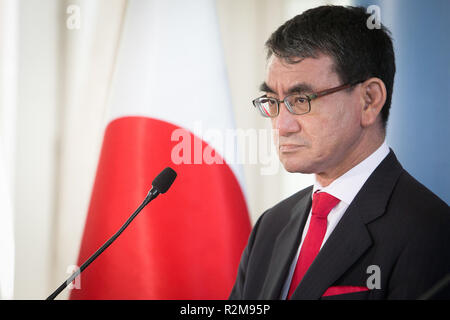 Japanese Foreign Minister Taro Kono (L) talks to journalists during a joint press conference with Polish Foreign Minister Jacek Czaputowicz (not pictured) at College of Europe in Warsaw, Poland on 6 July 2018 Stock Photo