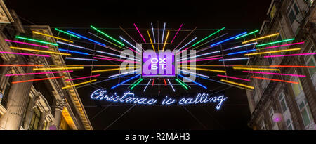 London, UK - November 19th 2018: A view of the festive Christmas lights on Oxford Street in London. Stock Photo