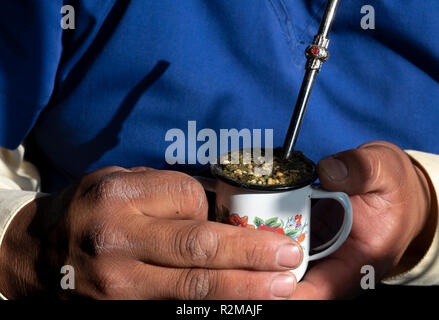 Close up of a man drinking mate in Reigolil, Chile Stock Photo