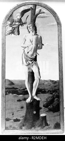 Saint Sebastian. Artist: Francesco Botticini (Francesco di Giovanni) (Italian, Florentine, ca. 1446-1497). Dimensions: Overall, with arched top and engaged frame, 56 3/4 x 26 1/4 in. (144.1 x 66.7 cm); painted surface 53 3/4 x 23 in. (136.5 x 58.4 cm).  The picture was purchased as a work of Andrea del Castagno. The treatment of the landscape, however, is uncharacteristic of Castagno's work, as is the feebly constructed figure. The closest affinities of style are with works by Francesco Botticini (about 1446-97), who seems to have been active in the workshop of Verrocchio in the late 1460s. Al Stock Photo