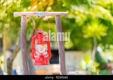 Beautiful red lantern hanging in outdoors garden Stock Photo