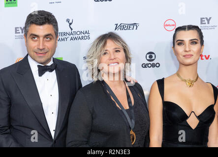 New York, NY - November 19, 2018: Ece Yorenc, Kerem Catay and Tuba Buyukustun attends the 46th Annual International Emmy Awards at New York Hilton Stock Photo