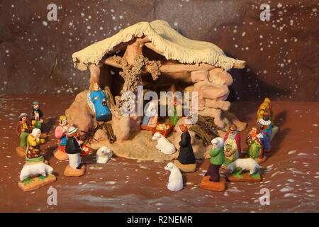 Nativity scene with provencal Christmas crib figures of Mary, Joseph ...