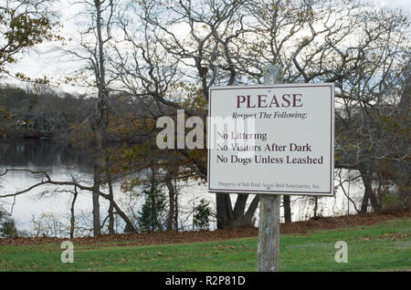 Sign stating Please Respect The Following : No Littering, No Visitors After Dark, No Dogs Unless Leashed at the Bourne Farm in Falmouth, Cape Cod, Mas Stock Photo