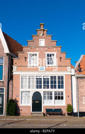 Historic house with stepped gable in old town of Enkhuizen, Noord-Holland, Netherlands Stock Photo