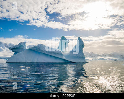 Pinnacle shaped icebergs floating in Andvord Bay near Neko Harbour, Antarctic Peninsula, Antarctica Stock Photo