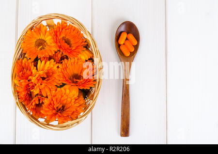 Medical preparations based on medicinal herbs. Flowers of calendula marigold. Studio Photo Stock Photo