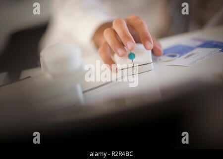 Hand using a computer mouse. Stock Photo