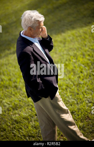 Mature businessman talking on a cell phone. Stock Photo