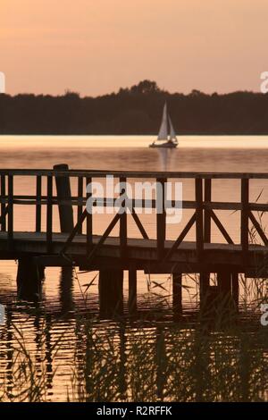 boat steeg lake in sunset Stock Photo