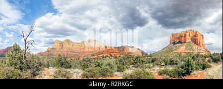 Rock formations near Sedona, Arizona. Seen here, under a cloudy sky, are Gibraltar, Baby Bell, Lee Mountain, and Courthouse Butte. Stock Photo