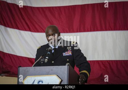 Brig. Gen. Jemal J. Beale, The Adjutant General of New Jersey, speaks during the change of command ceremony for outgoing commander Brig. Gen. Kevin J. Keehn and incoming commander Col. Patrick M. Kennedy on Joint Base McGuire-Dix-Lakehurst, N.J., Nov. 4, 2018. Stock Photo