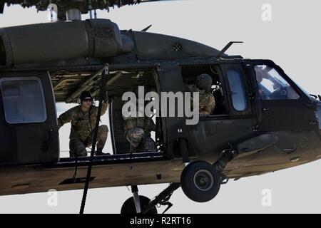 Ranger Rope Extraction U.S. Army Ranger soldiers fast rope from a USA UH-60 Black Hawk ...