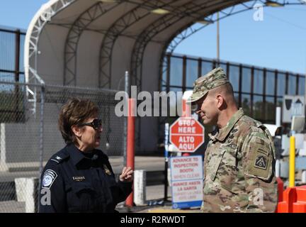 Lt. Gen. Jeffrey S. Buchanan, Commander of U.S. Army North, speaks with a U.S. Customs and Border Protection Office of Field Operations officer as he visits the CBP ports along the U.S. and Mexican Border in Arizona on Nov. 6, 2018. The two commanders visited three ports along the southern Arizona border to include: Douglas, Nogales and Lukeville. U.S Northern Command is providing military support to the Department of Homeland Security and U.S. Customs and Border Protection to secure the southern border of the United States. Stock Photo