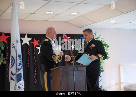 Retired retired U.S. Army Col. Roger Donlon (center), first recipient ...