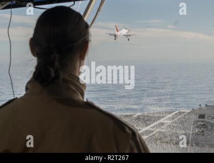 https://l450v.alamy.com/450v/r2t267/atlantic-ocean-nov-7-2018-aviation-boatswains-mate-fuel-airman-andrea-long-from-carlisle-ohio-logs-an-aircraft-touch-and-go-in-primary-flight-control-aboard-the-aircraft-carrier-uss-george-hw-bush-cvn-77-ghwb-is-underway-in-the-atlantic-ocean-conducting-routine-training-exercises-to-maintain-carrier-readiness-r2t267.jpg