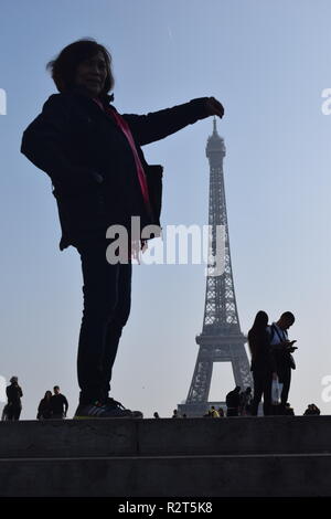 Premium Photo | Girl traveler pose at eiffel tower in paris france woman in  sunglasses jacket on sunny blue sky vacation travelling trip architecture  attraction landmark fashion style concept