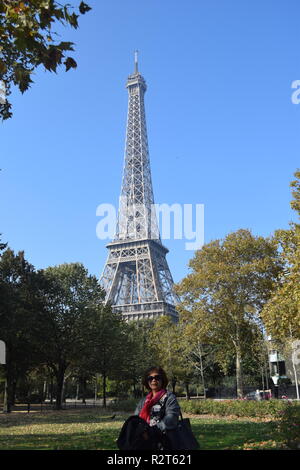 Free: Photo of Two Women Posing in Front of Eiffel Tower, Paris, France  during Day Time - nohat.cc