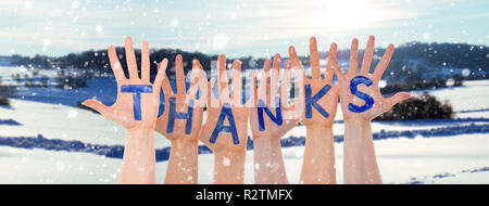 Many Hands Building Thanks, Winter Scenery As Background Stock Photo