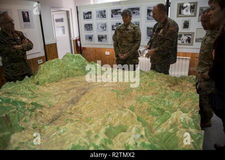Armed Forces of Bosnia and Herzegovina Kapetan Almir Kulugic, 5th Infantry Brigade, briefs U.S. Army Brig. Gen. Marti Bissell, NATO Headquarters Sarajevo commander, in their unit museum during a visit in Tuzla, BiH, Oct. 30, 2018. NHQSa staff visited the brigade to meet the soldiers and their leadership, and to familiarize themselves with 5th Infantry Brigade's mission and capabilities. Stock Photo