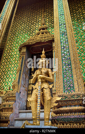 Golden statue at Wat Phra Kaew. Stock Photo