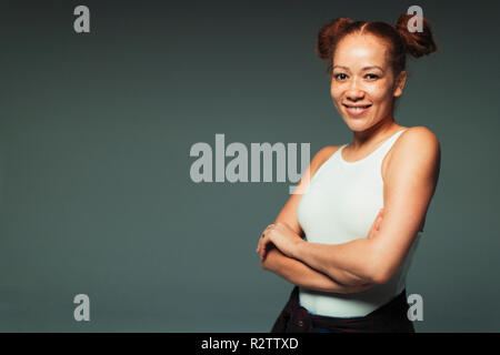 Portrait smiling, confident woman with freckles Stock Photo