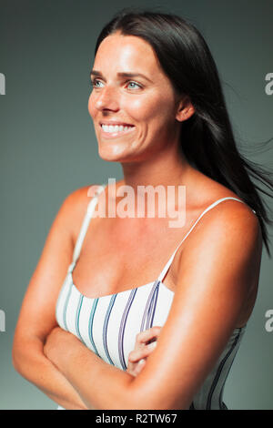 Portrait smiling, confident woman looking away Stock Photo