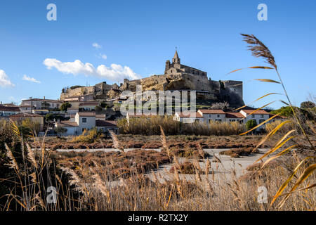 Fos-sur-Mer (south-eastern France). Town and Church of Saint-Sauveur, built on a tilted rock, registered as a National Historic Landmark (French “monu Stock Photo