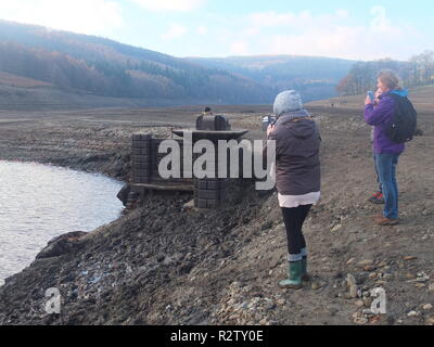 Crowds visit the exposed ruins of the demolished Derwent Hall normally
