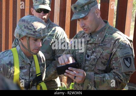 U.S. Army Lt. Col. Chad Ward (left) and U.S. Army Command Sgt. Maj ...