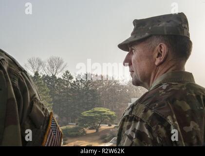 U.S. Army Gen. Robert B. Abrams, United Nations Command commander, tours the rooftop of the Joint Security Area (JSA), Panmunjom, Republic of Korea, Nov. 10, 2018. Abrams conducted an initial battlefield circulation of the JSA to understand the day-to-day operations and gain insight into the current state of the Demilitarized Zone. Stock Photo