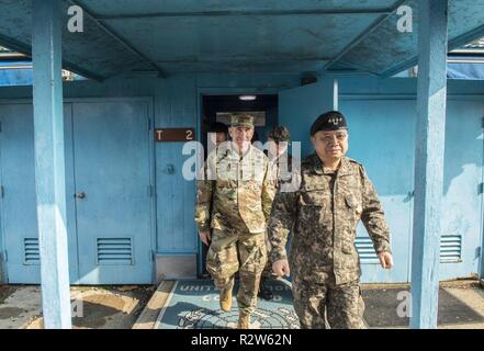 U.S. Army Gen. Robert B. Abrams, (center) United Nations Command (UNC) commander, exits the UNC Military Armistice Commission conference building at the Joint Security Area (JSA), Panmunjom, Republic of Korea (ROK), Nov. 10, 2018. Inside, Abrams and Gen. Park Han-Ki, ROK Chairman of Joint Chiefs of Staff, discussed their future plans to continue to promote peace and prosperity across the peninsula. Stock Photo