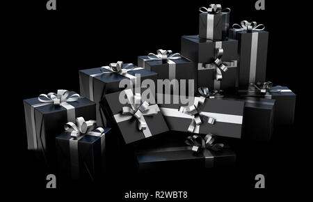 A scattered collection of various sized gift boxes wrapped in a shiny black paper and a silver ribbon and bow on an isolated dark studio background -  Stock Photo