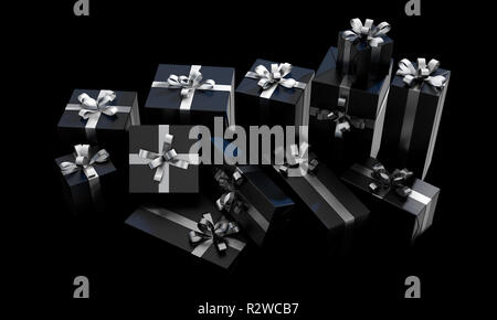 A scattered collection of various sized gift boxes wrapped in a shiny black paper and a silver ribbon and bow on an isolated dark studio background -  Stock Photo