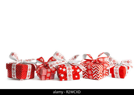 Different Christmas gift boxes and original ribbons Stock Photo